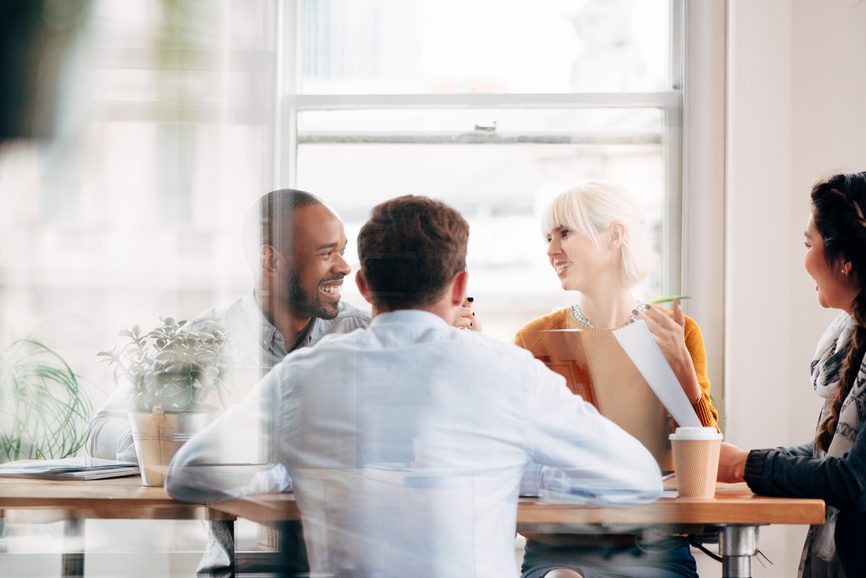 a business team meeting in an office setting