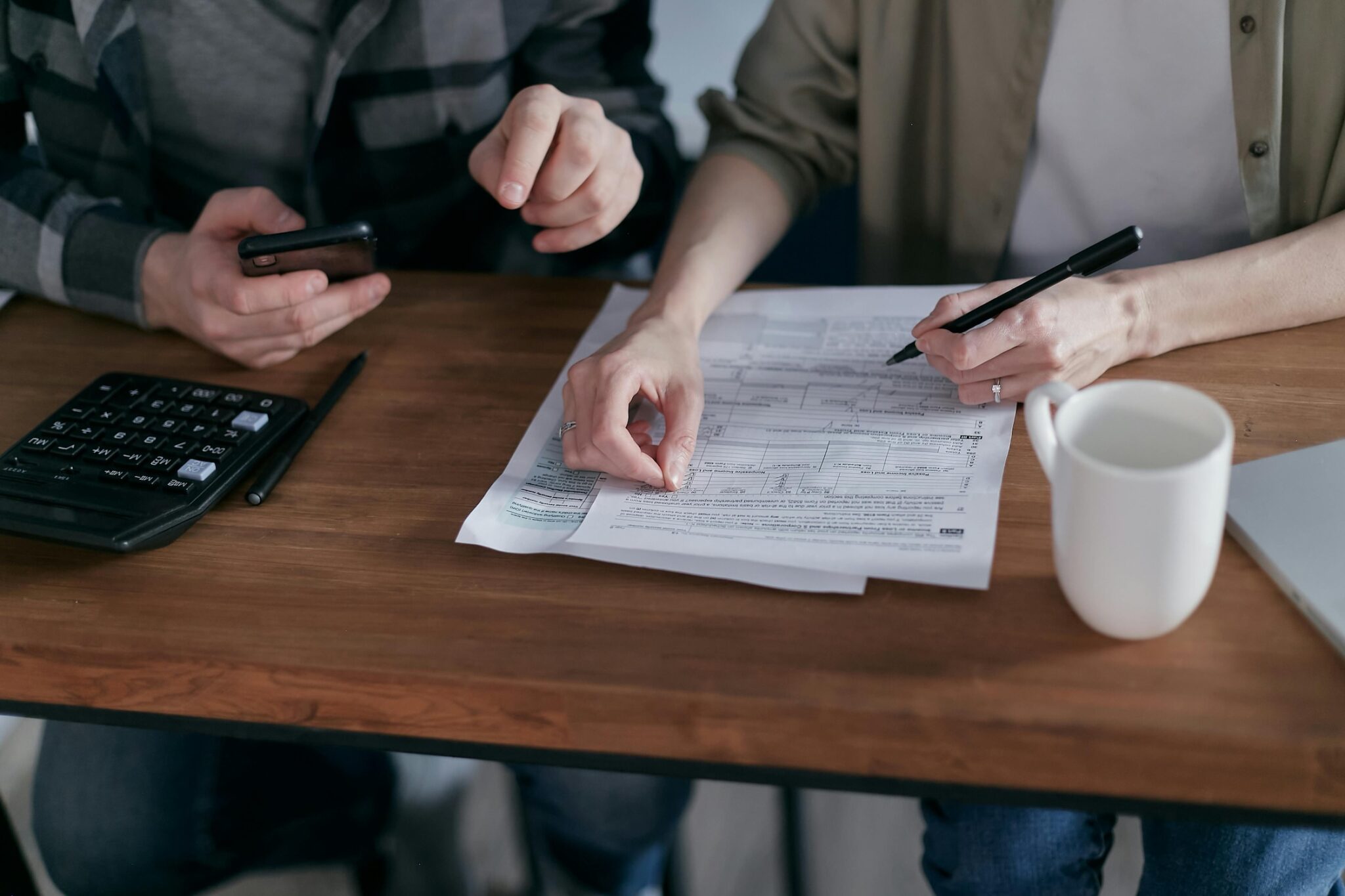 a couple working on taxes