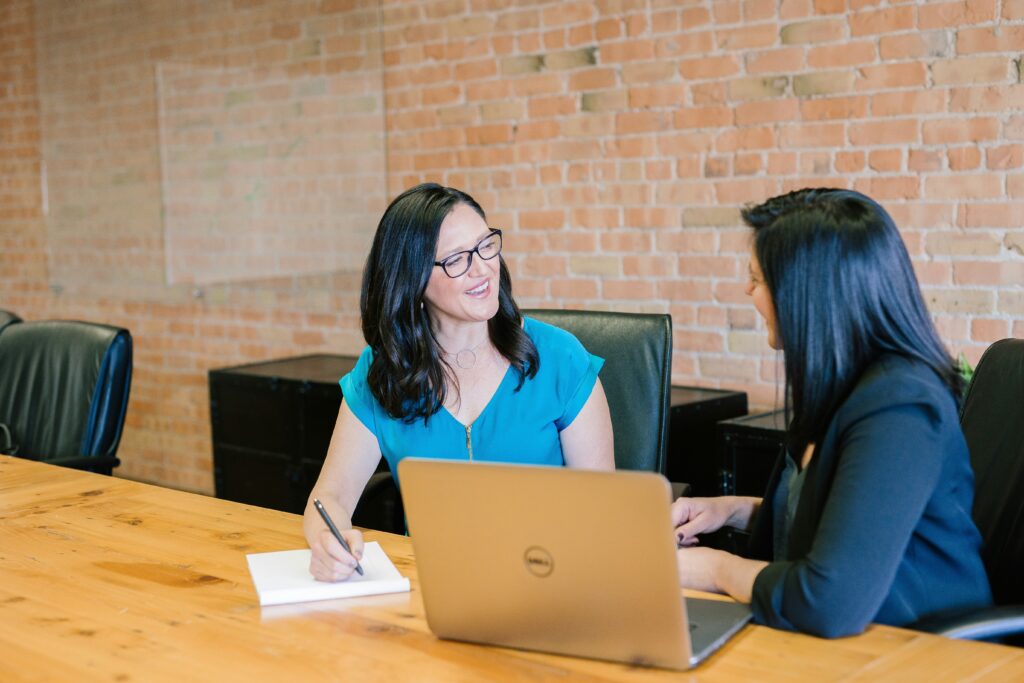 Image of a tax professional talking with a client.