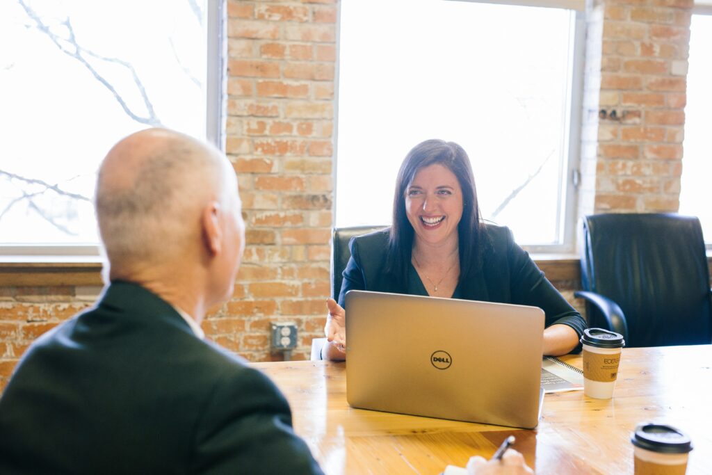 A tax professional in a meeting with a potential client.