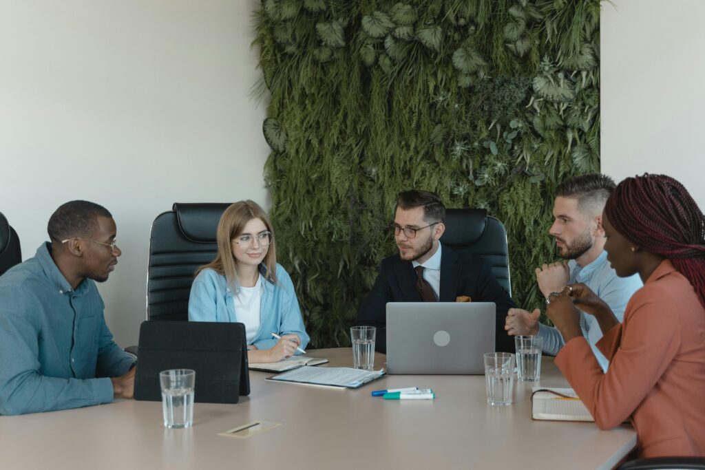 A group of professionals collaborating during the tax busy season.